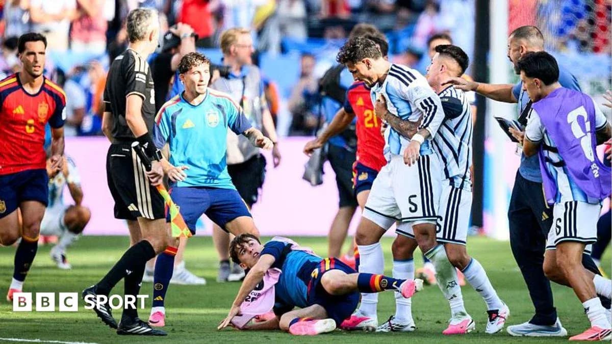Players from Argentina and Spain arguing on the field