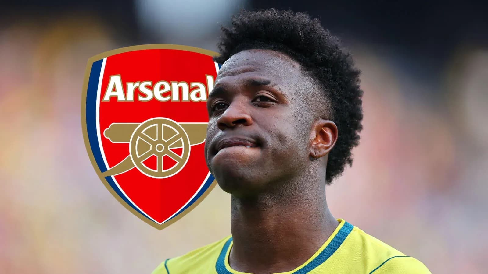 Игрок Arsenal на фоне логотипа клуба